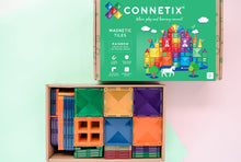 Load image into Gallery viewer, Connetix magnetic tiles set with colorful tiles and packaging on a light green background