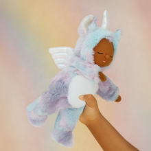 Load image into Gallery viewer, Plush toy resembling a dragon held by a hand against a gradient background