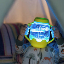 Load image into Gallery viewer, Child playing with Glo Pals Sensory Jar - Yellow