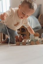 Load image into Gallery viewer, Toddler playing with Little Dutch Forest Friends Stacking Train