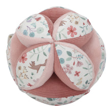 Load image into Gallery viewer, A soft baby toy in the shape of a ball with floral patterns and pink ribbed sections, featuring a label and a small rattle.
