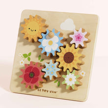 Load image into Gallery viewer, Wooden puzzle with colorful floral shapes on a beige background, featuring the Le Toy Van brand.