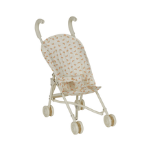 Load image into Gallery viewer, Miniature stroller with a patterned canopy on a white background
