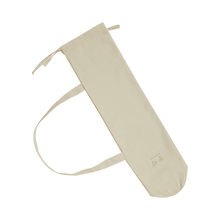 Load image into Gallery viewer, Beige drawstring bag on a white background