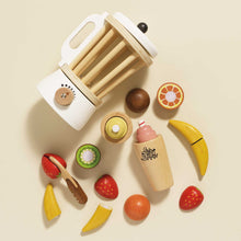 Load image into Gallery viewer, Set of wooden toy fruits and a toy kitchen appliance on a beige background