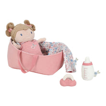 Load image into Gallery viewer, Baby doll in a pink crib with a bottle on a white background