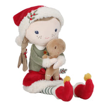 Load image into Gallery viewer, Plush toy Little dutch Rosa in Christmas attire holding a gingerbread man on a white background