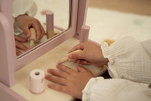Load image into Gallery viewer, Young girl playing with a pink little dutch dressing table and pretend nail varnish