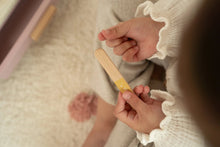 Load image into Gallery viewer, Young girl playing with a pink little dutch dressing table nail file