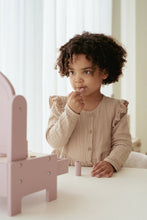 Load image into Gallery viewer, Young girl playing with a pink little dutch dressing table
