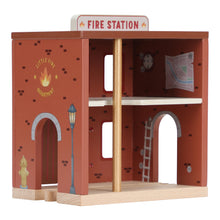 Load image into Gallery viewer, Wooden toy fire station with details and a clock on a white background
