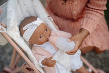 Load image into Gallery viewer, Baby doll in a stroller being held by a person in a pink dress.