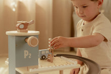 Load image into Gallery viewer, Child playing with a wooden toy set on a table