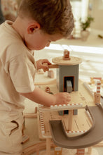 Load image into Gallery viewer, Child playing with a wooden toy set