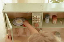 Load image into Gallery viewer, Child playing with a toy kitchen set, opening a cabinet door.