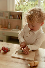 Load image into Gallery viewer, Boy playing with Little Dutch Slicing Vegetables and cutting vegetables