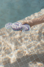 Load image into Gallery viewer, Child playing with Little dutch Dreamy Mermaid Dive Figures Set of three ocean-themed weighted learn to swim aids: a mermaid, a starfish, and a seahorse