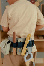 Load image into Gallery viewer, Boy playing with Little Dutch Toy tool belt with various tools
