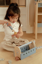 Load image into Gallery viewer, girl playing with Little dutch Wooden toy toolbox with tools