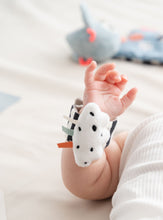 Load image into Gallery viewer, Baby playing with Done by Deer Wrist Rattles Happy Clouds - 2 Pack Blue