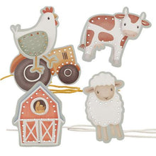 Load image into Gallery viewer, A set of lacing cards featuring farm animals and a tractor with a barn, including cards and string for lacing.
