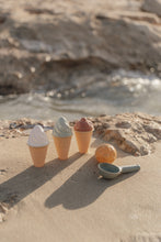 Load image into Gallery viewer, Ice cream cones and a scoop on a sandy beach
