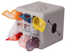 Load image into Gallery viewer, Gray toy cube with colorful cut-out shapes on a white background
