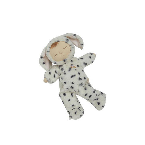 Stuffed toy resembling a baby in a dalmatian costume on a black background