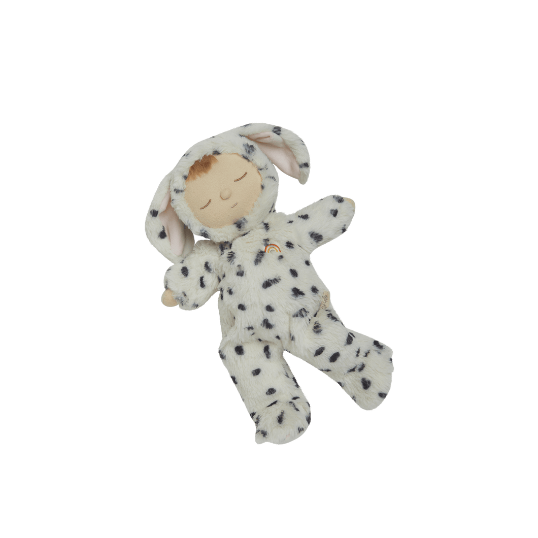 Stuffed toy resembling a baby in a dalmatian costume on a black background