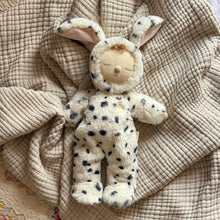 Load image into Gallery viewer, Stuffed animal toy with spotted pattern and bunny ears on a textured beige blanket
