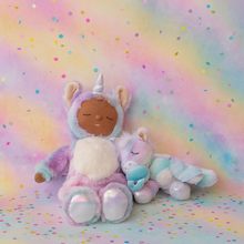 Load image into Gallery viewer, Stuffed unicorn toy with a rainbow and polka dot background
