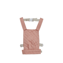 Load image into Gallery viewer, Olli ella Pink baby carrier with straps on a black background
