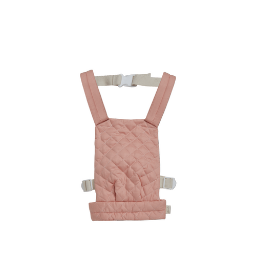 Olli ella Pink baby carrier with straps on a black background