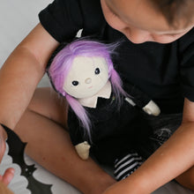 Load image into Gallery viewer, Child holding a plush toy with purple hair on a neutral background
