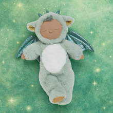 Load image into Gallery viewer, Plush toy dragon on a green background with star-like decorations
