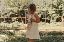 Load image into Gallery viewer, Girl playing with Farmer Rosa
