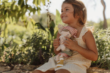 Load image into Gallery viewer, Girl playing with Farmer Rosa
