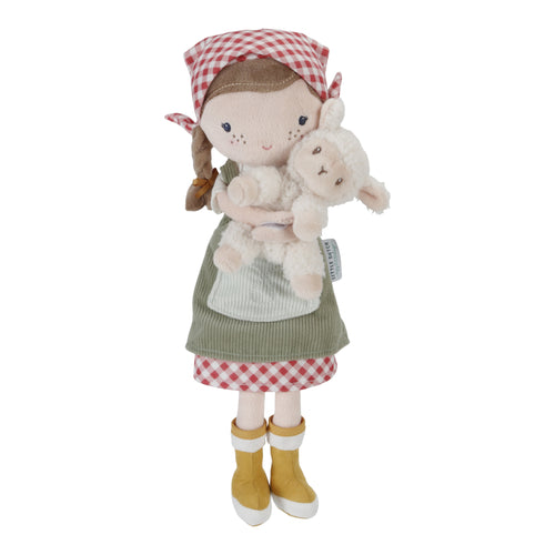Plush cuddle doll named Rosa wearing a red and white checkered dress and a green apron, holding a white sheep. The doll has brown hair, wears yellow boots, and has a red and white checkered headscarf.