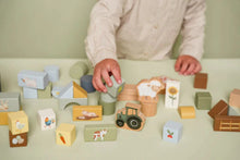 Load image into Gallery viewer, Child playing with Little Dutch Little Farm Building Blocks
