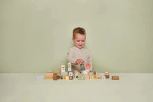 Load image into Gallery viewer, Boy playing with Little Dutch Little Farm Building Blocks
