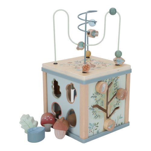 The image shows a forest friends themed activity cube with various interactive elements such as a bead maze, shape sorter, and spinning gears, designed for toddlers.