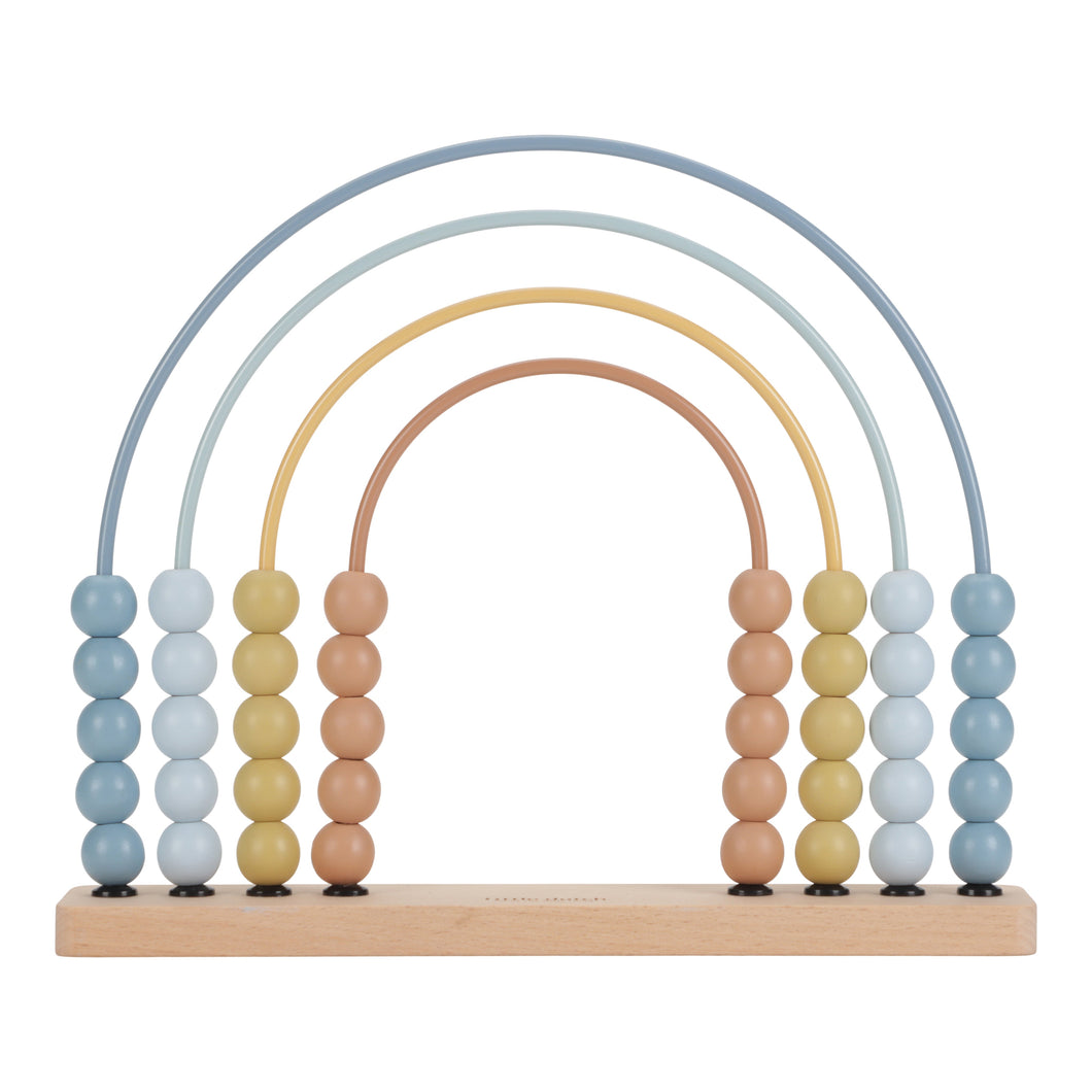 A rainbow-shaped abacus with beads in shades of blue and beige, constructed with a wooden base and metal frame.