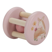 Load image into Gallery viewer, A pink and beige wooden roller rattle toy with a ball in the center and four cylindrical supports. With a pretty image of  deer and a ladybird.
