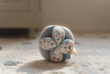 Load image into Gallery viewer, a gripping ball with forest friend design 
