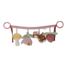 Load image into Gallery viewer, A stroller toy chain featuring plush toys including a mushroom, a deer, a flower, and a strawberry, attached to a pink strap.
