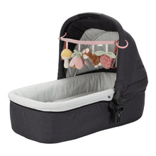 Load image into Gallery viewer, the stroller toy chain attached to a cot, featuring plush toys including a mushroom, a deer, a flower, and a strawberry, attached to a pink strap.
