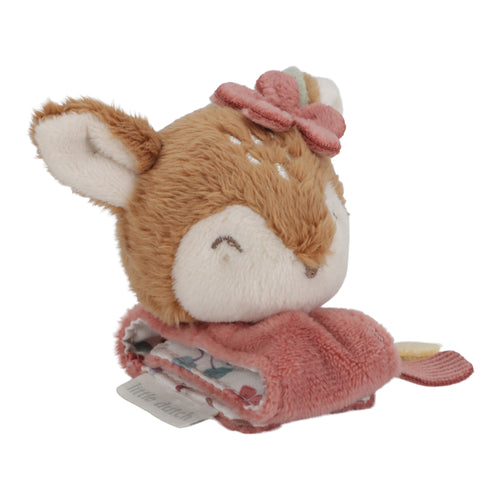 A plush wrist rattle featuring a deer design with a flower on the head.