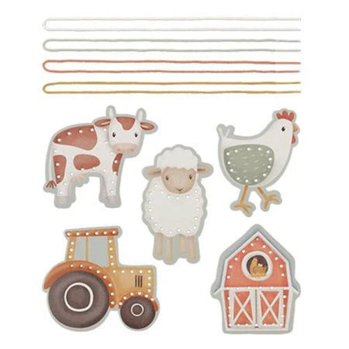 A set of lacing cards featuring farm animals and a tractor with a barn, including cards and string for lacing.
