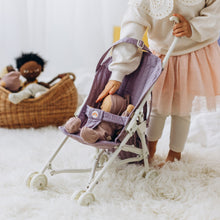 Load image into Gallery viewer, child touching head of baby doll in stroller 
