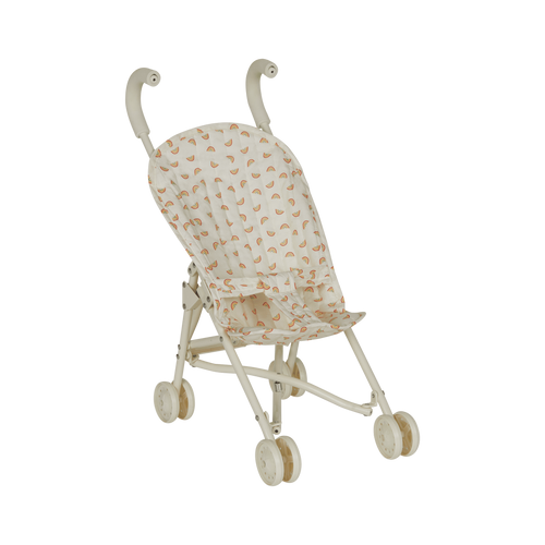 Miniature stroller with a patterned canopy on a white background